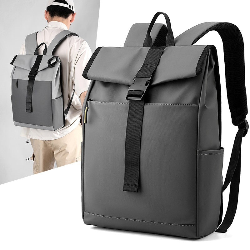 Gray backpack with black straps on a white background