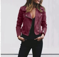 Person wearing a red leather jacket against a white background