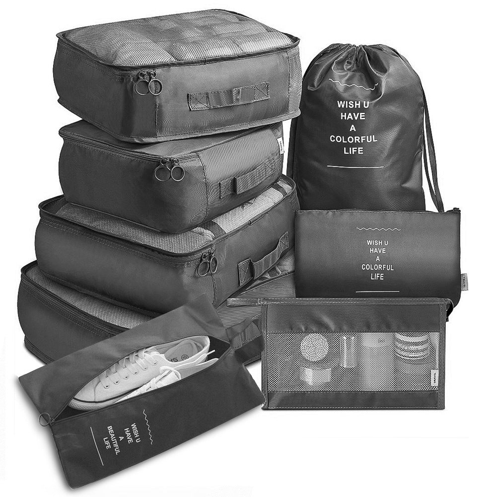 Set of black travel packing cubes and bags with text on a white background