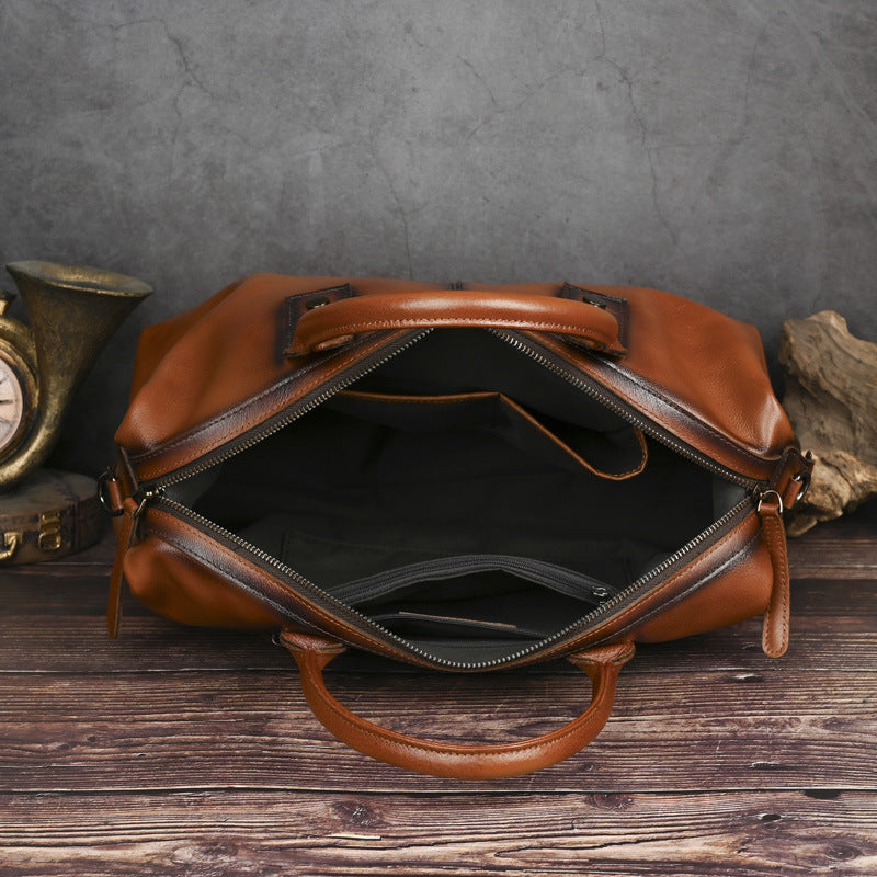 Interior view of women's genuine leather handbag showing spacious main compartment and zipper pocket