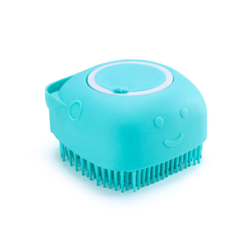 Turquoise grooming brush with bristles on a white background