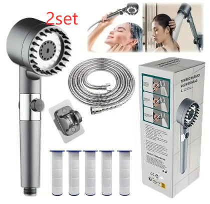 Handheld shower head set with hose, filters, and packaging on a white background