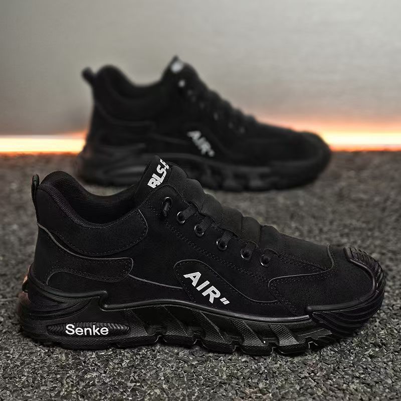 Black sneakers with 'Senke' branding on a textured surface