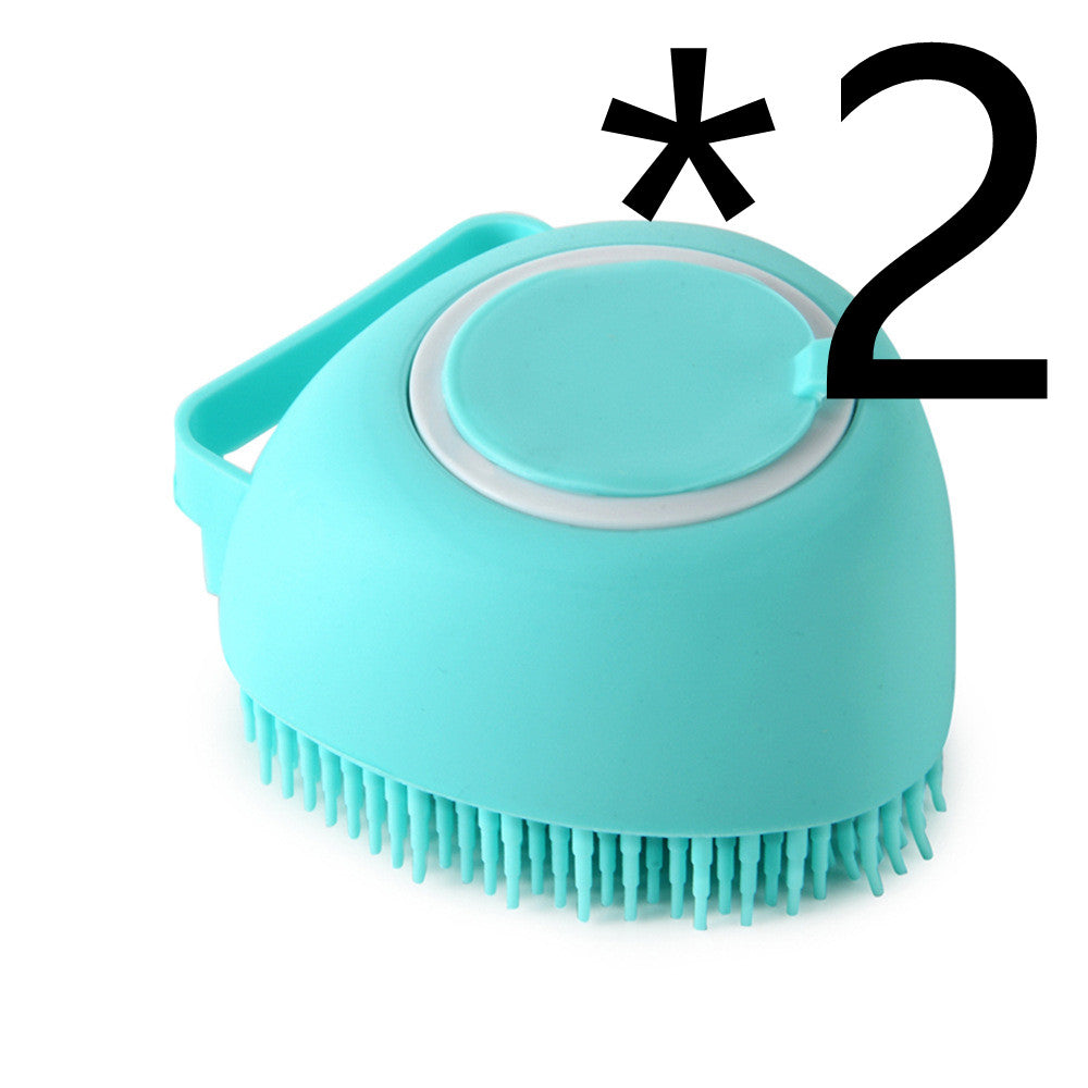 Turquoise silicone scrubber with bristles on a white background