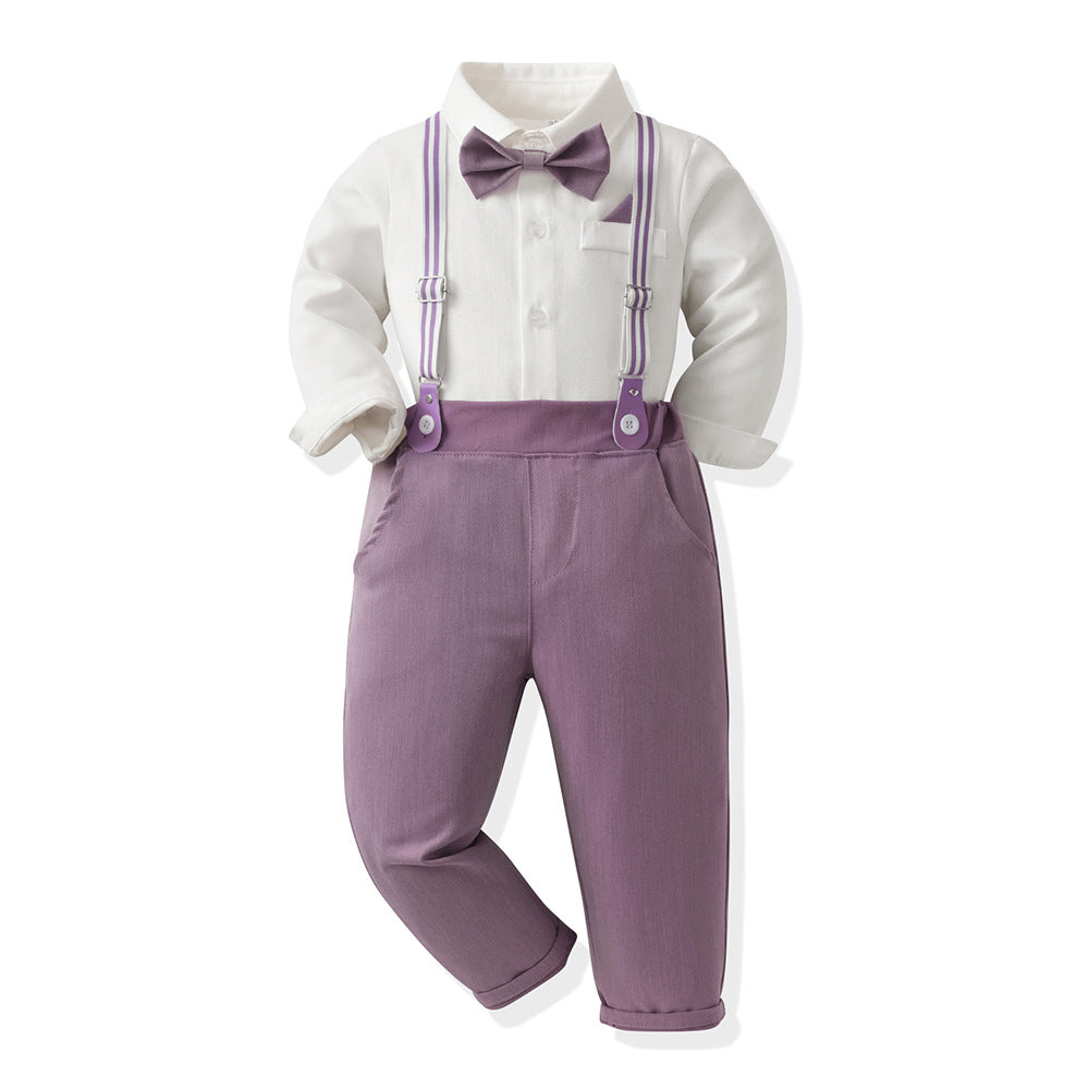 A baby boy's formal outfit consisting of a white long-sleeve shirt, dusty purple suspenders, matching purple bow tie, and purple trousers, shown on a white background.
