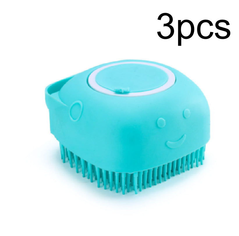 A turquoise silicone hair-brush cleaning brush with soft bristles and a smiling face, shown on a white background with the text '3pcs' in the top right corner.