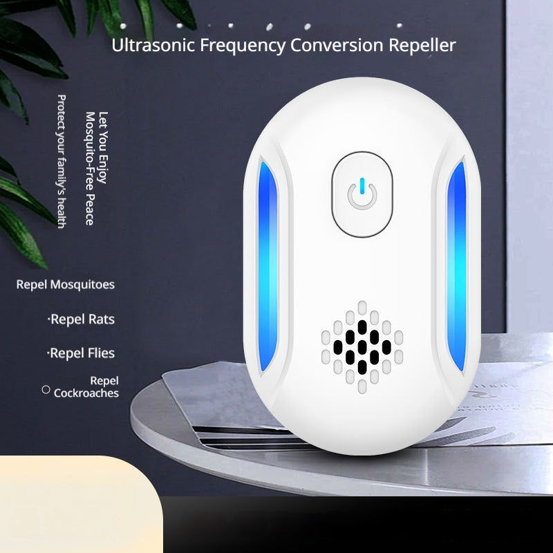 White ultrasonic mosquito repellent device with blue illuminated side panels and a power button, shown on a tabletop with product text overlays.