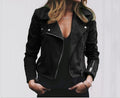 Black leather jacket worn by a person on a plain background