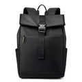Black backpack with a yellow tag on a white background
