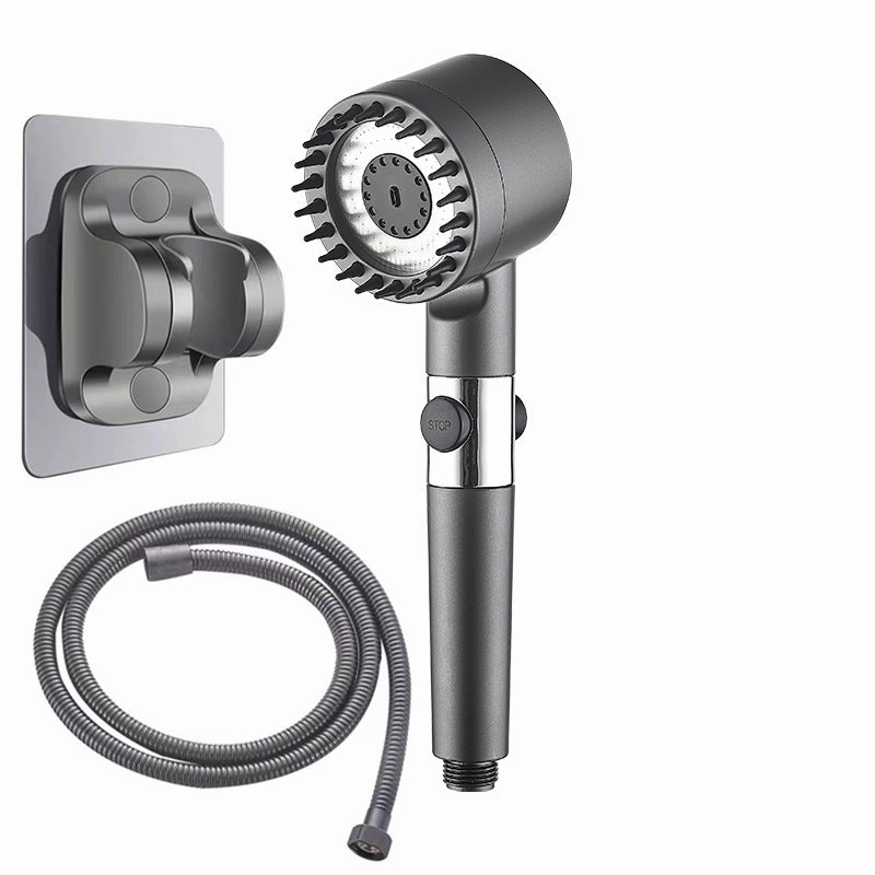 Shower head with handheld shower and hose on a white background