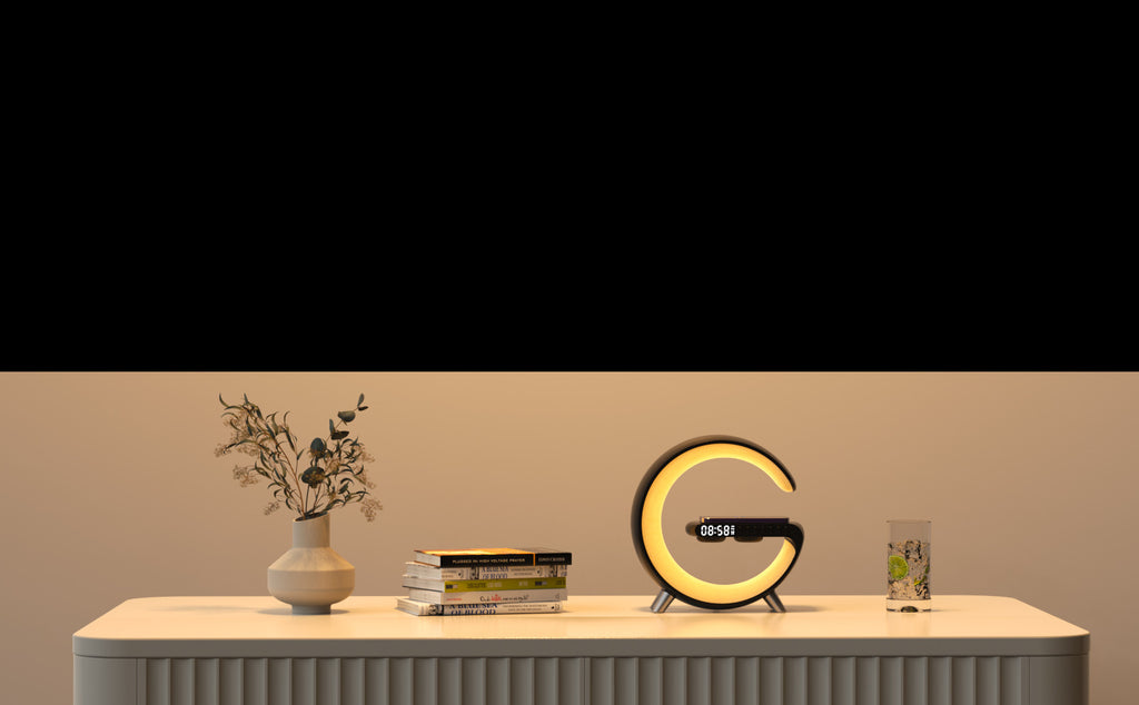 Decorative table with a vase, books, and a round clock on a beige wall background