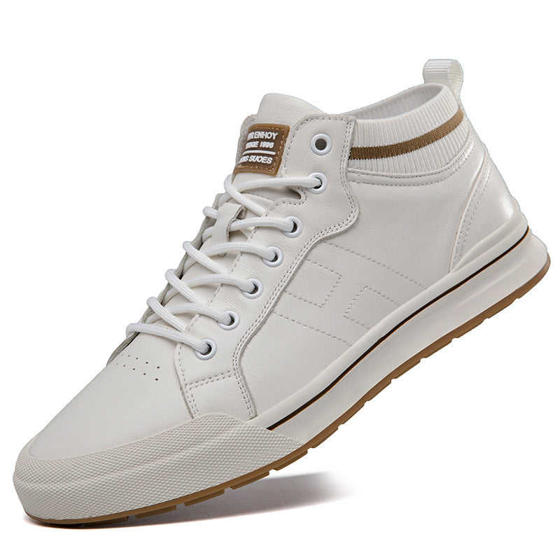 A white mid-top sneaker with white laces, a textured white leather upper, a brown textured heel tab, and a brown outsole, shown on a white background.