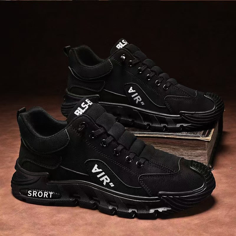 Black athletic shoes with visible branding on a dark background