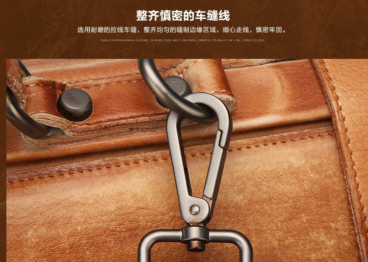 Close-up of a brown leather bag with metal hardware and stitching details.