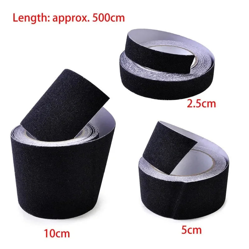 Three rolls of black adhesive tape shown on a white background with red text indicating sizes: 10cm, 5cm, and 2.5cm, plus a note at the top stating length is approximately 500cm.