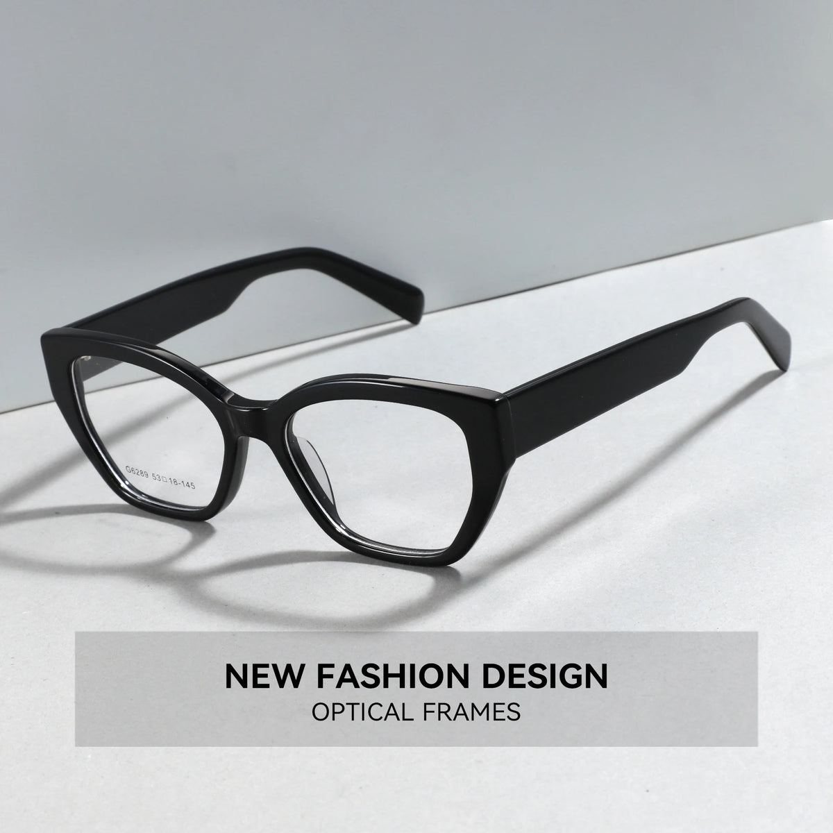 Black optical frames on a light gray surface with 'NEW FASHION DESIGN' text.