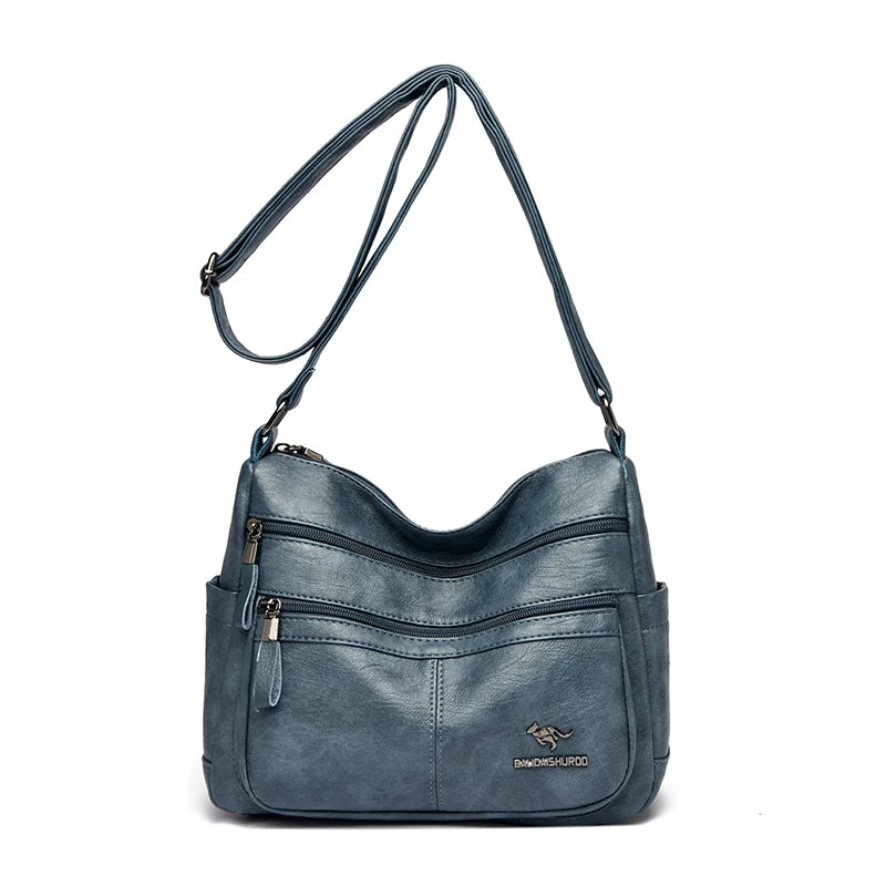 Blue handbag with a visible brand logo on a white background