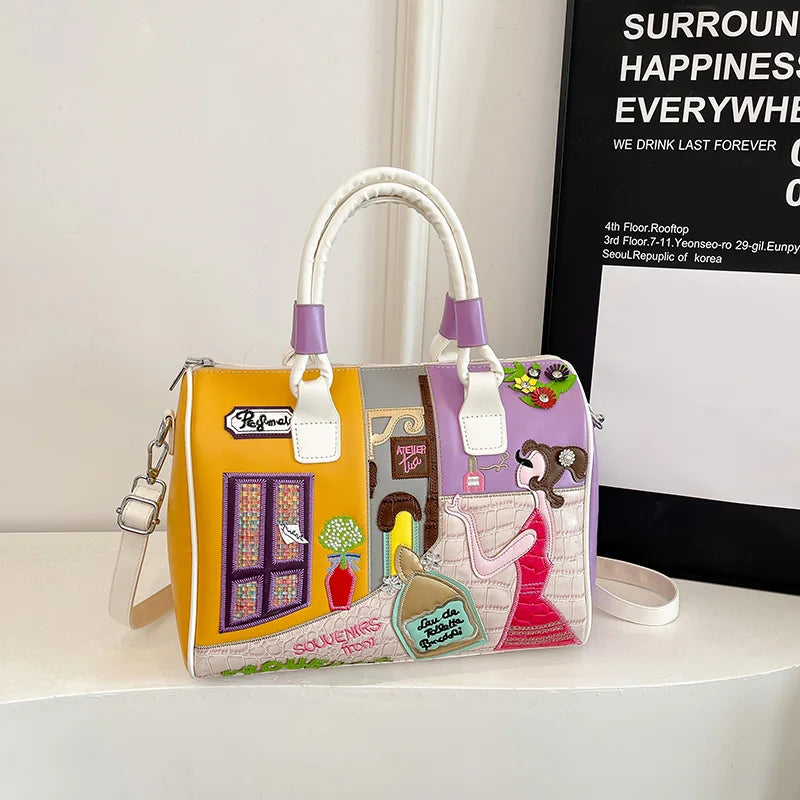 Colorful handbag with artistic design on a white surface