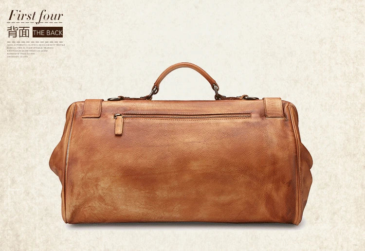 Brown leather duffel bag on a textured beige background