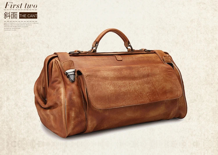 Brown leather duffel bag on a beige background