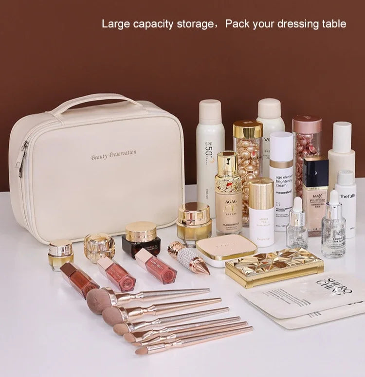 Makeup products including a beige travel case on a white surface with a brown background.