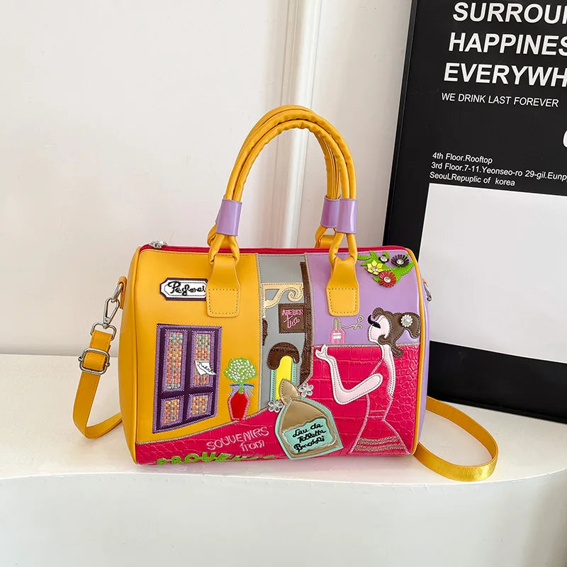 Colorful handbag with decorative design on a white surface