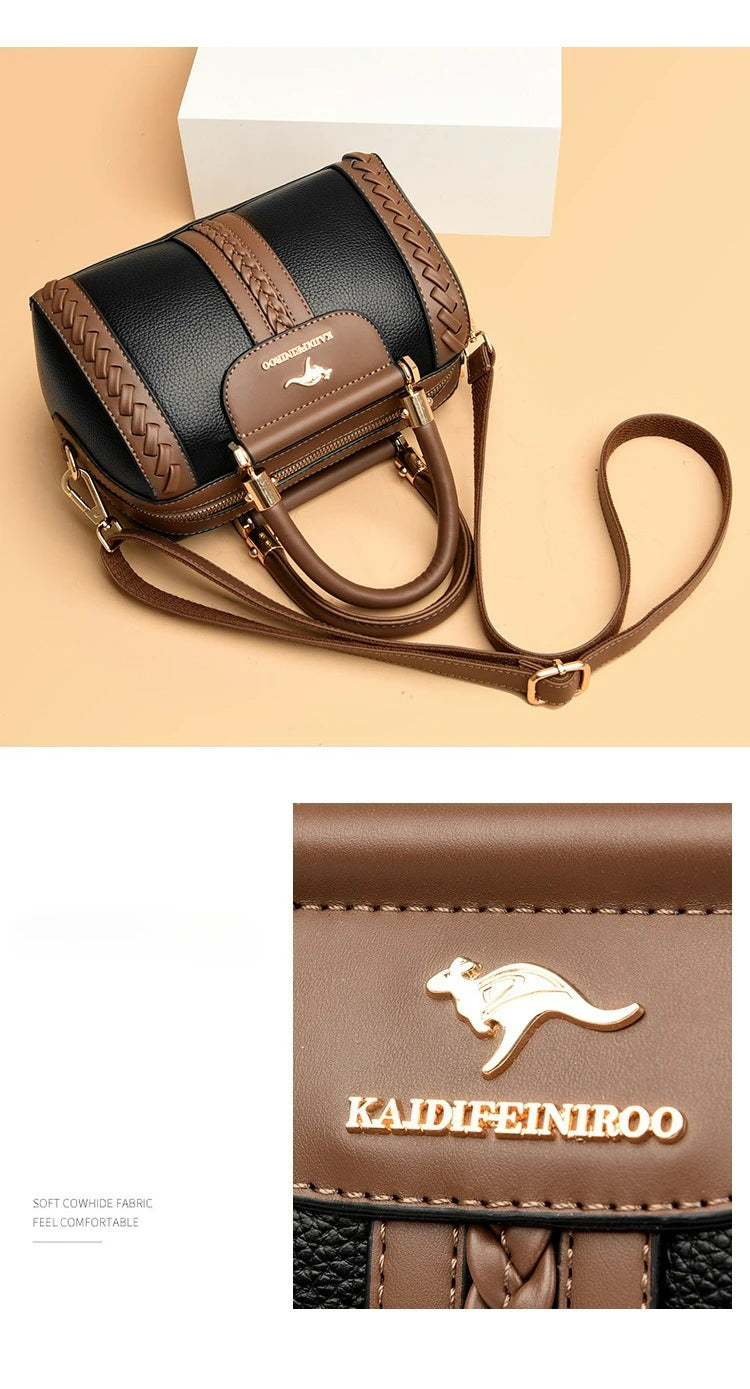 A structured handbag in black and brown faux leather with braided trim, gold-tone hardware, and a long shoulder strap, shown on a beige background. A close-up inset shows the front panel with a kangaroo logo and the text KAIDIFEINIROO.