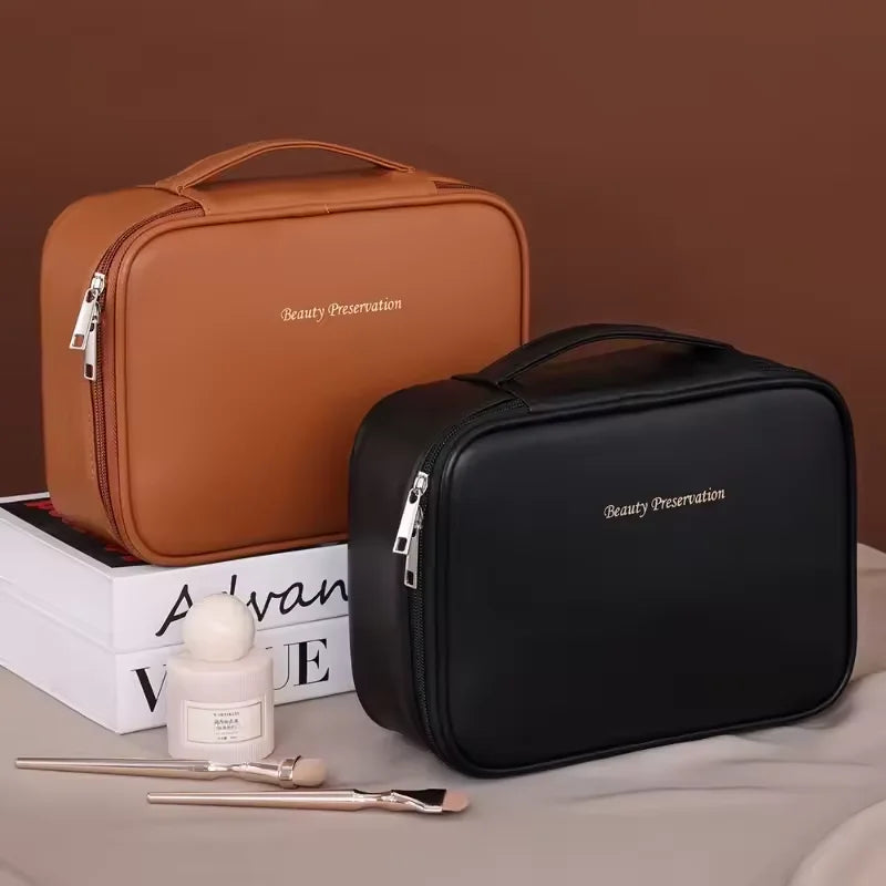 Two cosmetic bags, one brown and one black, with 'Beauty Preservation' branding on a neutral background.