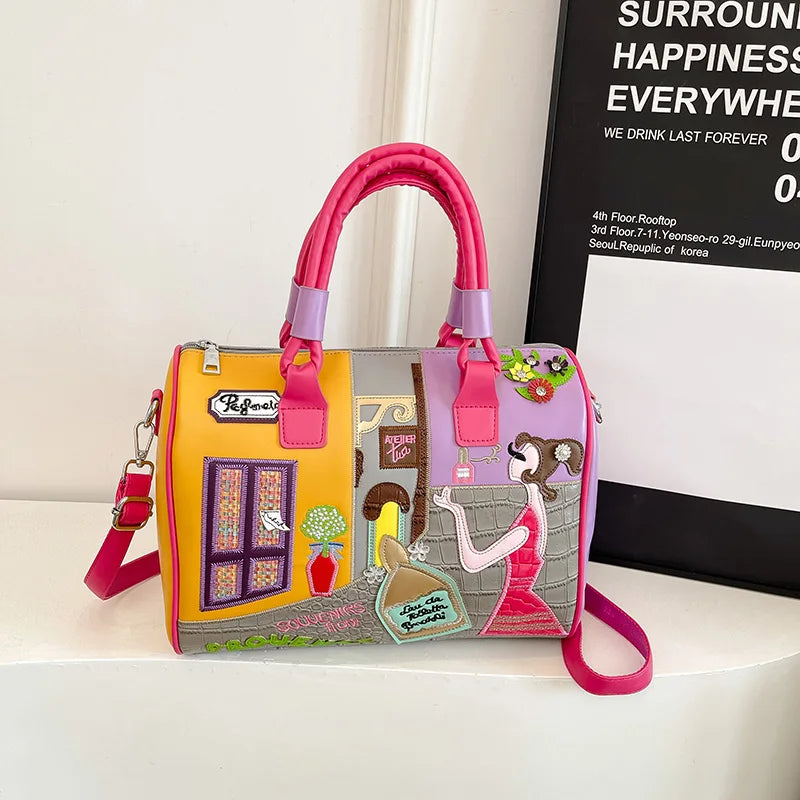 Colorful handbag with artistic design on a white surface
