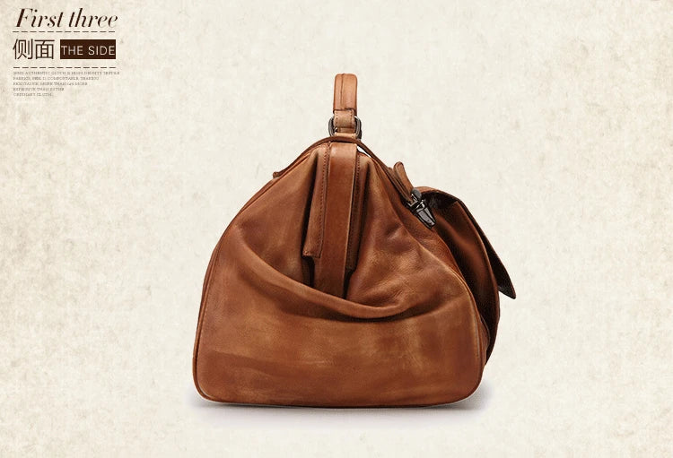 Brown leather handbag on a textured beige background