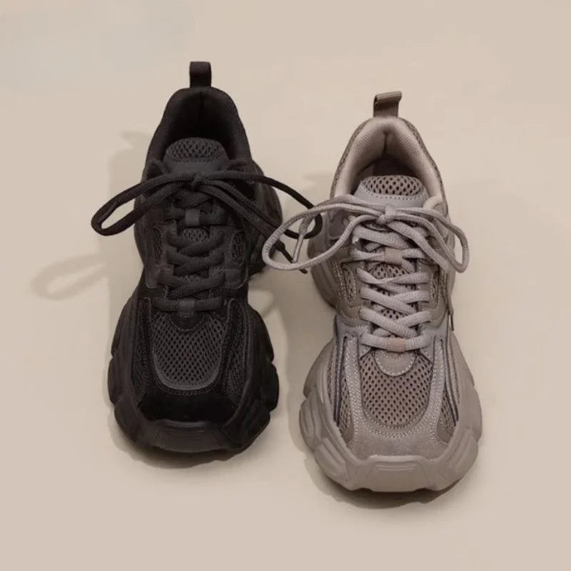 Black and gray sneakers on a light background