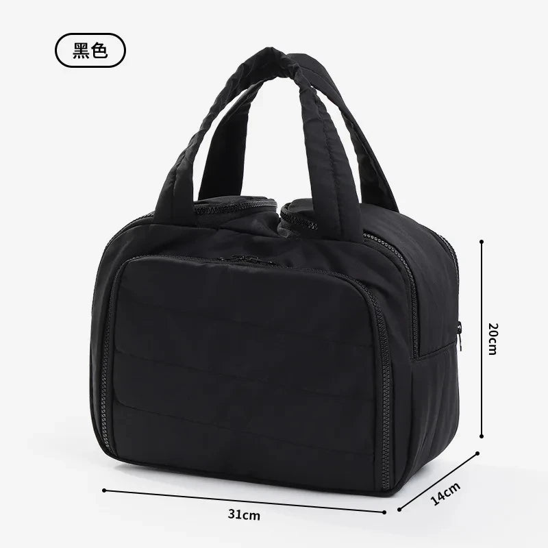 Black handbag with measurements on a white background