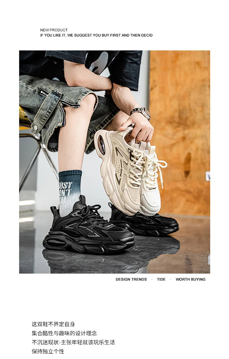 Person holding two pairs of sneakers with a wooden floor background