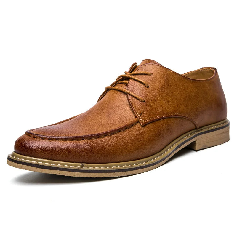 Brown leather shoe on a white background