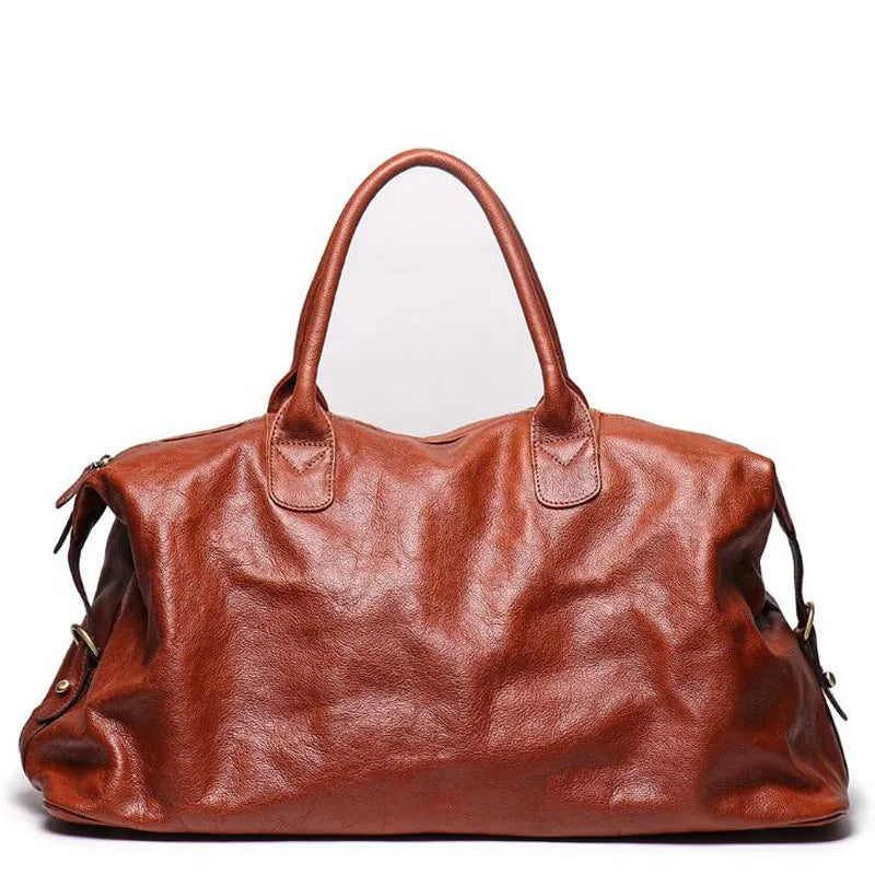 Brown leather handbag on a white background