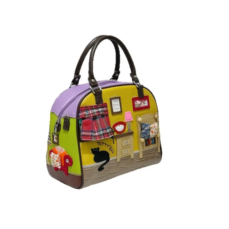 Colorful handbag with a design of a room and a black cat on a white background