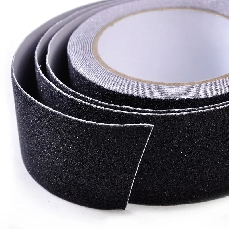 Black sandpaper roll on a white background