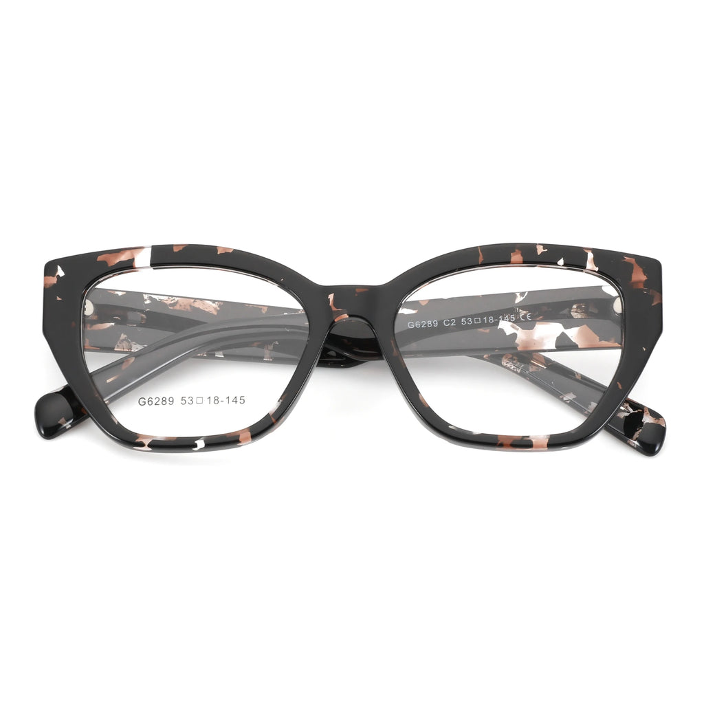 Cat-eye eyeglasses with a glossy black acetate frame featuring a terracotta and white marble pattern, shown on a plain white background.