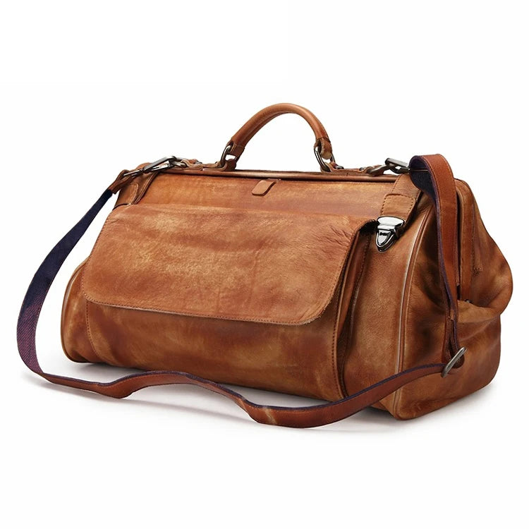 Brown leather duffel bag on a white background