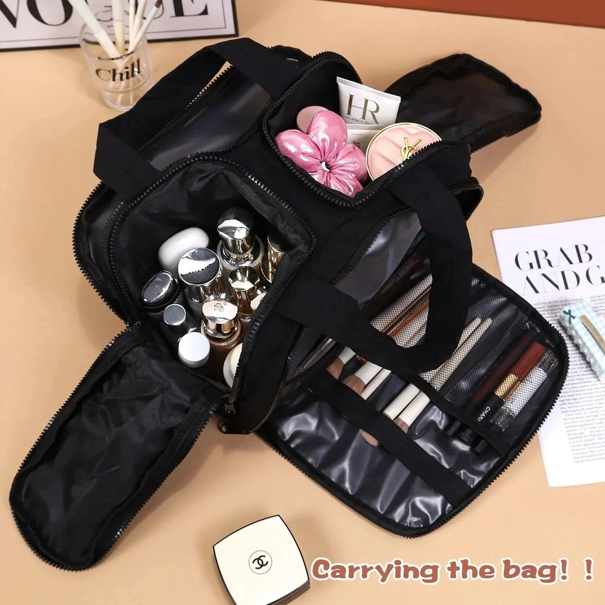 Black makeup bag with cosmetic items on a beige surface