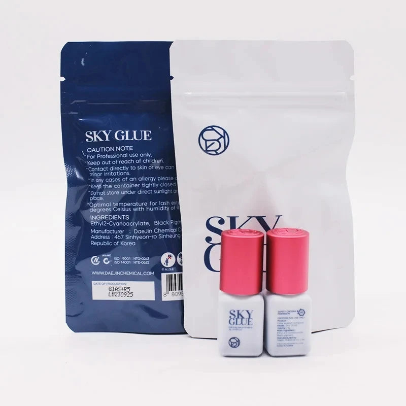 SKY GLUE packaging including a blue pouch, white box, and two small bottles with pink caps on a white background.