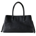 Black leather handbag on a white background