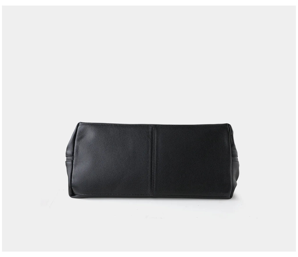 A black textured leather clutch or pouch bag shown from the bottom against a clean white background.