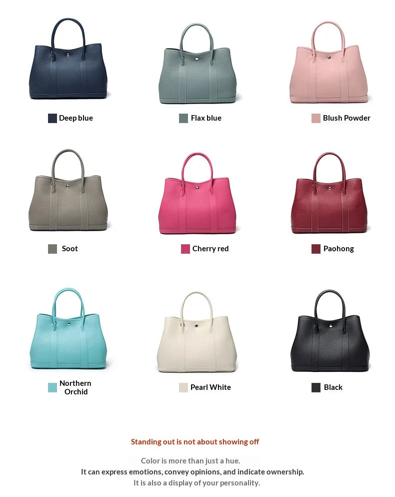 Collection of handbags in various colors on a white background