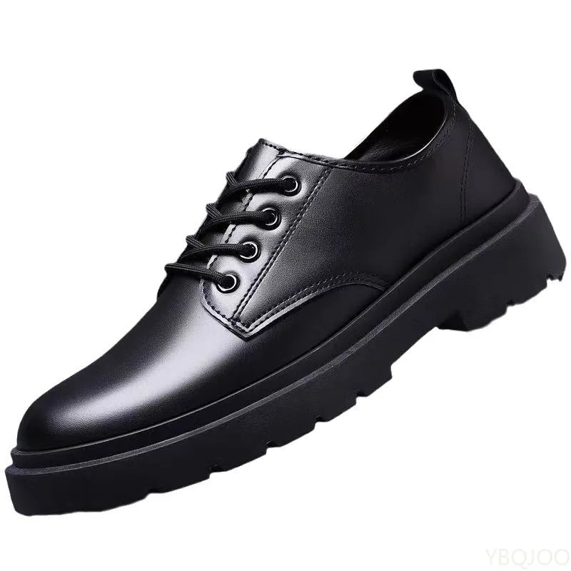 Black leather shoe on a white background