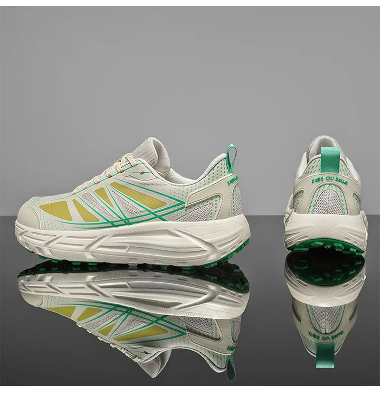A pair of chunky white sneakers with green and yellow accents, shown from the side and back on a reflective black surface against a gray background.
