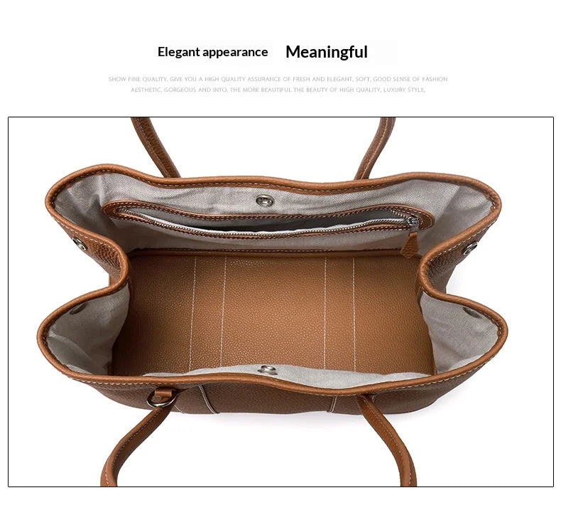 An overhead view of a brown textured leather tote bag shown open, displaying its interior lining, zippered pocket, and strap attachments against a white background with decorative text at the top.