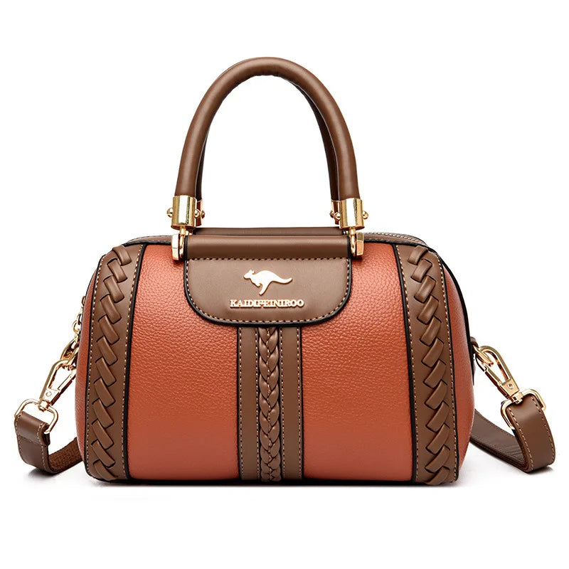 Brown handbag with braided details and visible brand logo on a white background