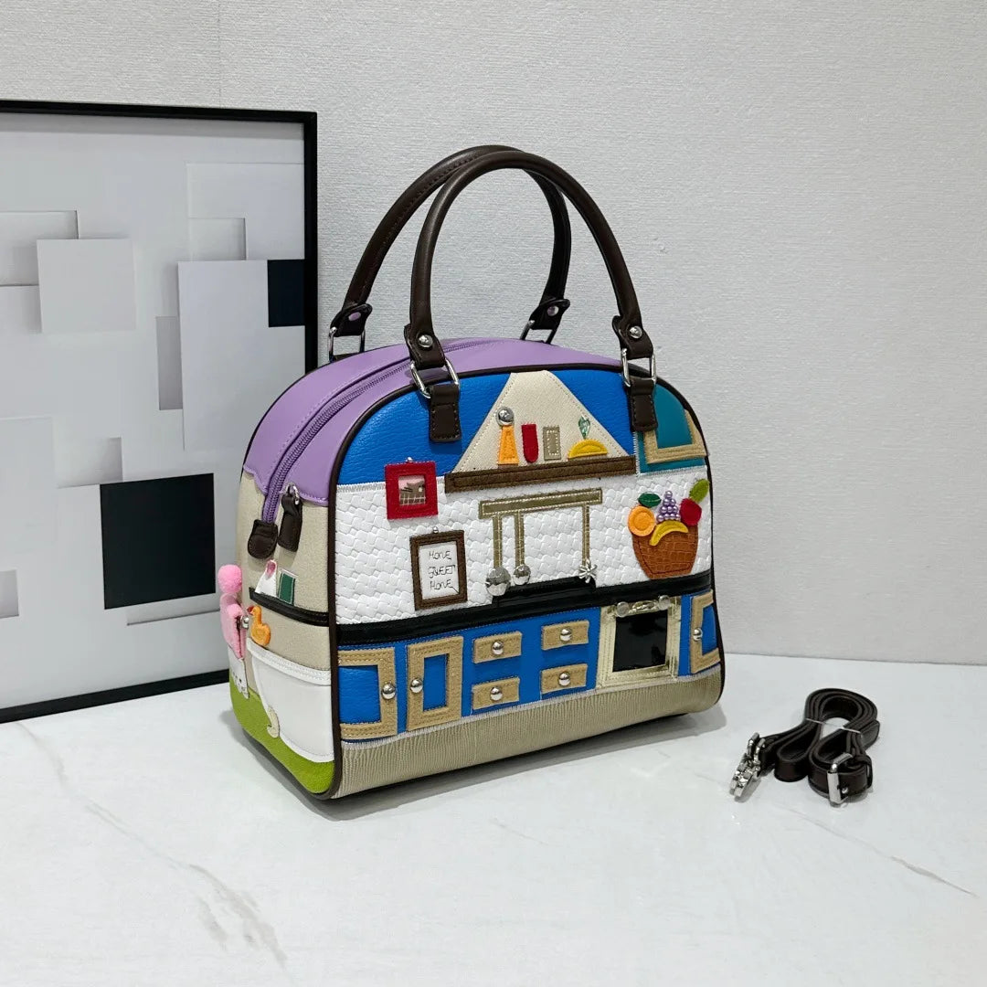 Colorful handbag with artistic design on a white surface