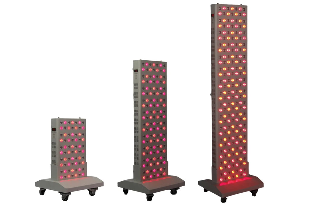 Three tall, rectangular LED display stands with red and pink lights on a white background.